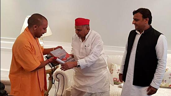 UP chief minister Yogi Adityanath with SP leaders Mulayam Singh Yadav and Akhilesh Yadav. (ANI file photo)
