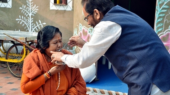 Union Minister of Minority Affairs Mukhtar Abbas Naqvi offers a sweet dish to Union Minister of State for Consumer Affairs Sadhvi Niranjan Jyoti on the occasion of Bhai Dooj.(ANI)