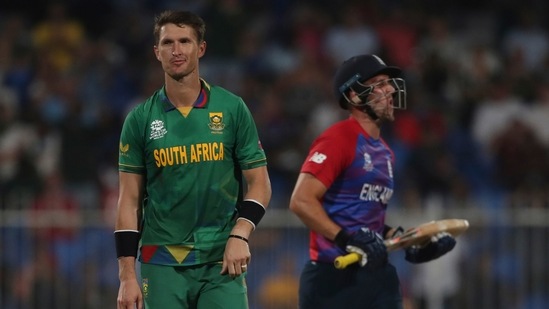 South Africa's Dwaine Pretorius celebrates the dismissal of England's Liam Livingstone, right, during the Cricket Twenty20 World Cup match between England and South Africa in Sharjah, UAE, Saturday, Nov. 6, 2021. (AP Photo/Aijaz Rahi)(AP)