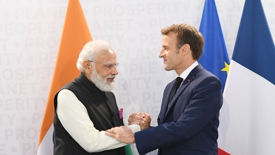 PM Modi with President Emmanuel Macron at G20 summit in Rome.