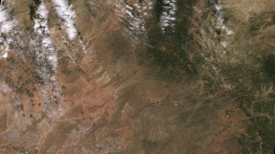 This image collected by Landsat 9 on October 31, 2021, and released by NASA, shows the Navajo Nation in the Western United States. - Landsat and other satellite data help people monitor drought conditions and manage irrigation water. With only 85 rain gauges to cover more than 27,000 square miles, satellite data and climate models are filling the gaps to help the Navajo Nation monitor drought severity. (Photo by Handout / various sources / AFP) (AFP) This image collected by Landsat 9 on October 31, 2021, and released by NASA, shows the Navajo Nation in the Western United States. - Landsat and other satellite data help people monitor drought conditions and manage irrigation water. With only 85 rain gauges to cover more than 27,000 square miles, satellite data and climate models are filling the gaps to help the Navajo Nation monitor drought severity. (Photo by Handout / various sources / AFP) (AFP)