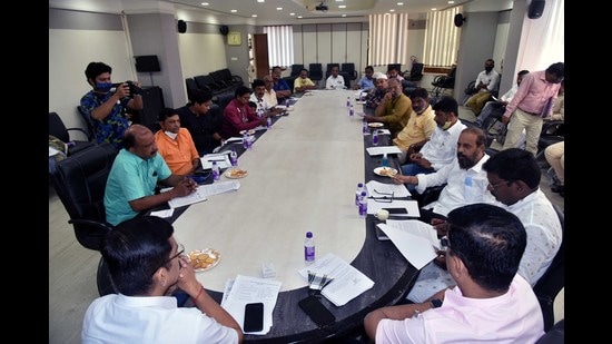 The Kalyan Dombivli Municipal Corporation officials and political leaders meet regarding updating of voters and getting them registered in Kalyan earlier this week. (Rishikesh Choudhary/HT PHOTO)