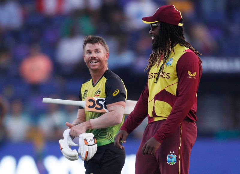West Indies' Chris Gayle with Australia's David Warner after the T20 World Cup match&nbsp; (REUTERS)