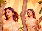 When it comes to fashion, Mouni Roy knows it all. Her Instagram feed speaks volumes about her love for all things stylish and fashionable. In her recent Instagram post, the Gold actor flaunted her beige floral saree.(Instagram/@imouniroy) When it comes to fashion, Mouni Roy knows it all. Her Instagram feed speaks volumes about her love for all things stylish and fashionable. In her recent Instagram post, the Gold actor flaunted her beige floral saree.(Instagram/@imouniroy)