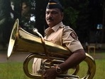 Arif Shaikh, member of the Mumbai Police Band, also known as “Khaki Studio” on YouTube, with his trumpet after a practice session in Naigaon, Mumbai.(Photo by Satish Bate/HindustanTimes) Arif Shaikh, member of the Mumbai Police Band, also known as “Khaki Studio” on YouTube, with his trumpet after a practice session in Naigaon, Mumbai.(Photo by Satish Bate/HindustanTimes)