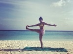 Tanishaa Mukerji's throwback Yoga on beach is all about Padangusthasana twist(Instagram/tanishaamukerji) Tanishaa Mukerji's throwback Yoga on beach is all about Padangusthasana twist(Instagram/tanishaamukerji)