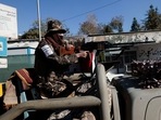 A Taliban fighter stands watch at a checkpoint in Kabul, Afghanistan November 5, 2021. REUTERS/Zohra Bensemra