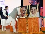 Prime Minister Narendra Modi pays homage to Jana Sangh leader Deen Dayal Upadhyaya and Syama Prasad Mukherjee during the BJP National Executive meeting, at the NDMC Convention centre, in New Delhi on Sunday. (ANI) Prime Minister Narendra Modi pays homage to Jana Sangh leader Deen Dayal Upadhyaya and Syama Prasad Mukherjee during the BJP National Executive meeting, at the NDMC Convention centre, in New Delhi on Sunday. (ANI)