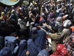 In picture - Internally displaced Afghans from northern provinces, who fled their home due to fighting between the Taliban and Afghan security personnel, wait to receive free food in a public park in Kabul, Afghanistan on Aug. 10, 2021.(AP ) In picture - Internally displaced Afghans from northern provinces, who fled their home due to fighting between the Taliban and Afghan security personnel, wait to receive free food in a public park in Kabul, Afghanistan on Aug. 10, 2021.(AP )