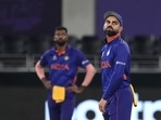 India's captain Virat Kohli reacts to a boundary hit by New Zealand's Daryl Mitchell during the Cricket Twenty20 World Cup match between New Zealand and India in Dubai, UAE, Sunday, Oct. 31, 2021.(AP) India's captain Virat Kohli reacts to a boundary hit by New Zealand's Daryl Mitchell during the Cricket Twenty20 World Cup match between New Zealand and India in Dubai, UAE, Sunday, Oct. 31, 2021.(AP)