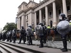 Riot police guard Victoria's Parliament House as activists protest against coronavirus disease in Melbourne, Australia in this file picture taken in September 2021(Reuters/Representative Photo) Riot police guard Victoria's Parliament House as activists protest against coronavirus disease in Melbourne, Australia in this file picture taken in September 2021(Reuters/Representative Photo)