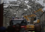 A view of the rubble of the collapsed 21-story apartment building under construction in Lagos, Nigeria. (AP Photo) A view of the rubble of the collapsed 21-story apartment building under construction in Lagos, Nigeria. (AP Photo)