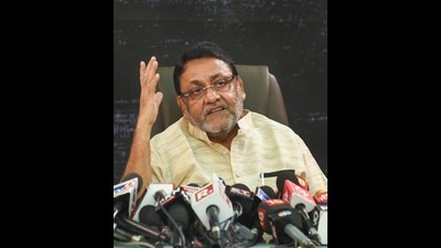 Maharashtra Minister Nawab Malik addresses a press conference at Kurla in Mumbai on Sunday. (PTI)