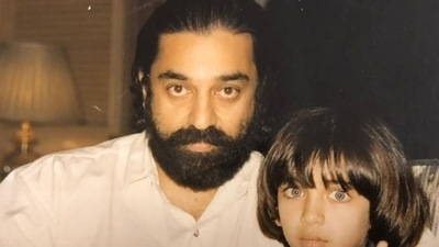 Young Akshara Haasan poses with Kamal Haasan. Young Akshara Haasan poses with Kamal Haasan.