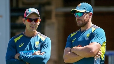 File photo of Justin Langer (L) with captain Aaron Finch. (AP) File photo of Justin Langer (L) with captain Aaron Finch. (AP)