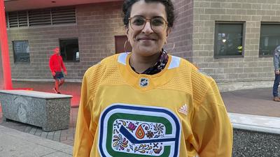 Jag Nagra wearing the commemorative Diwali jersey she designed for Vancouver Canucks in Canada. (Supplied photo) Jag Nagra wearing the commemorative Diwali jersey she designed for Vancouver Canucks in Canada. (Supplied photo)
