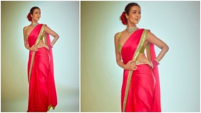 Malaika Arora accessorised her ethnic look with a diamond choker and pink bangles on just one wrist. (Instagram/@malaikaaroraofficial)