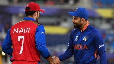 Indian Skipper Virat Kohli and Afghanistan's Mohammad Nabi during the ICC Mens T20 World Cup 2021 match between India and Afghanistan at Sheikh Zayed Stadium in Abu Dhabi on Wednesday. (ANI) Indian Skipper Virat Kohli and Afghanistan's Mohammad Nabi during the ICC Mens T20 World Cup 2021 match between India and Afghanistan at Sheikh Zayed Stadium in Abu Dhabi on Wednesday. (ANI)