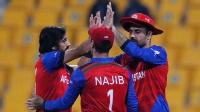 Afghanistan's Mohammad Nabi celebrates taking a catch&nbsp; (REUTERS)