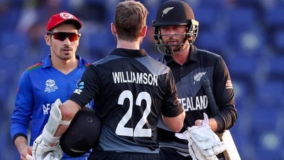 New Zealand's captain Kane Williamson shakes hands with teammate Devon Conway, right, following their Cricket Twenty20 World Cup match against Afghanistan in Abu Dhabi, UAE, Sunday, Nov. 7, 2021. (AP Photo/Kamran Jebreili) (AP) New Zealand's captain Kane Williamson shakes hands with teammate Devon Conway, right, following their Cricket Twenty20 World Cup match against Afghanistan in Abu Dhabi, UAE, Sunday, Nov. 7, 2021. (AP Photo/Kamran Jebreili) (AP)