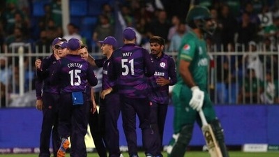 Scotland's Chris Greaves, third left without cap, celebrates with teammates the dismissal of Pakistan's Fakhar Zaman, right, during the Cricket Twenty20 World Cup match between Pakistan and Scotland in Sharjah, UAE, Sunday, Nov. 7, 2021. (AP) Scotland's Chris Greaves, third left without cap, celebrates with teammates the dismissal of Pakistan's Fakhar Zaman, right, during the Cricket Twenty20 World Cup match between Pakistan and Scotland in Sharjah, UAE, Sunday, Nov. 7, 2021. (AP)