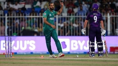 Pakistan's Imad Wasim, left, celebrates the dismissal of Scotland's Matthew Cross, right, during the Cricket Twenty20 World Cup match between Pakistan and Scotland in Sharjah, UAE, Sunday, Nov. 7, 2021. (AP) Pakistan's Imad Wasim, left, celebrates the dismissal of Scotland's Matthew Cross, right, during the Cricket Twenty20 World Cup match between Pakistan and Scotland in Sharjah, UAE, Sunday, Nov. 7, 2021. (AP)