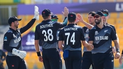 New Zealand's Trent Boult, third right, is congratulated by teammates after taking the wicket of Afghanistan's Hazratullah Zazai during the Cricket Twenty20 World Cup match between New Zealand and Afghanistan in Abu Dhabi, UAE, Sunday, Nov. 7, 2021. (AP Photo/Kamran Jebreili) (AP) New Zealand's Trent Boult, third right, is congratulated by teammates after taking the wicket of Afghanistan's Hazratullah Zazai during the Cricket Twenty20 World Cup match between New Zealand and Afghanistan in Abu Dhabi, UAE, Sunday, Nov. 7, 2021. (AP Photo/Kamran Jebreili) (AP)