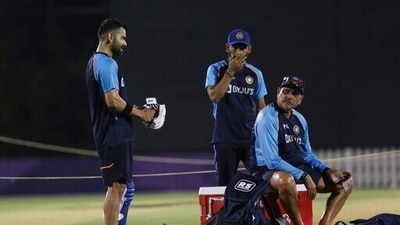 Coach Ravi Shastri, right, talks with captain Virat Kohli, left, during a training session a day ahead of their match against Pakistan, in Dubai, UAE, Saturday, Oct. 23, 2021. (AP) Coach Ravi Shastri, right, talks with captain Virat Kohli, left, during a training session a day ahead of their match against Pakistan, in Dubai, UAE, Saturday, Oct. 23, 2021. (AP)