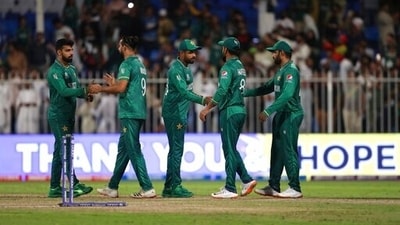 Pakistan players greet each other after their win in the Cricket Twenty20 World Cup match against Scotland in Sharjah, UAE, Sunday, Nov. 7, 2021. (AP) Pakistan players greet each other after their win in the Cricket Twenty20 World Cup match against Scotland in Sharjah, UAE, Sunday, Nov. 7, 2021. (AP)