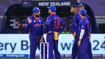 India's Rohit Sharma talks to captain Virat Kohli after the fall of Zealand's Martin Guptill wicket during the Cricket Twenty20 World Cup match between New Zealand and India in Dubai, UAE, Sunday, Oct. 31, 2021 (AP) India's Rohit Sharma talks to captain Virat Kohli after the fall of Zealand's Martin Guptill wicket during the Cricket Twenty20 World Cup match between New Zealand and India in Dubai, UAE, Sunday, Oct. 31, 2021 (AP)