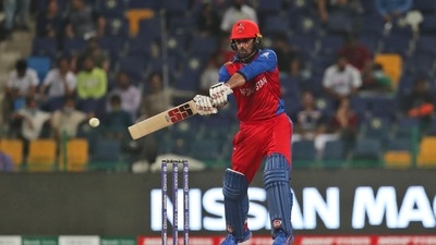 Afghanistan's captain Mohammad Nabi bats during the Cricket Twenty20 World Cup match between India and Afghanistan in Abu Dhabi, UAE, Wednesday, Nov. 3, 2021. (AP) Afghanistan's captain Mohammad Nabi bats during the Cricket Twenty20 World Cup match between India and Afghanistan in Abu Dhabi, UAE, Wednesday, Nov. 3, 2021. (AP)