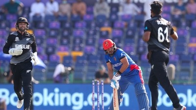 Afghanistan's Gulbadin Naib, centre, reacts after he was dismissed by New Zealand's Ish Sodhi, right, during the Cricket Twenty20 World Cup match between New Zealand and Afghanistan in Abu Dhabi, UAE, Sunday, Nov. 7, 2021. (AP Photo/Kamran Jebreili) (AP) Afghanistan's Gulbadin Naib, centre, reacts after he was dismissed by New Zealand's Ish Sodhi, right, during the Cricket Twenty20 World Cup match between New Zealand and Afghanistan in Abu Dhabi, UAE, Sunday, Nov. 7, 2021. (AP Photo/Kamran Jebreili) (AP)