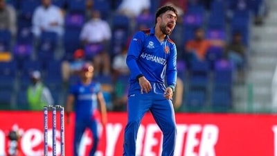 Afghanistan bowler Rashid Khan reacts during the Cricket Twenty20 World Cup match between New Zealand and Afghanistan in Abu Dhabi, UAE, Sunday, Nov. 7, 2021. (AP) Afghanistan bowler Rashid Khan reacts during the Cricket Twenty20 World Cup match between New Zealand and Afghanistan in Abu Dhabi, UAE, Sunday, Nov. 7, 2021. (AP)