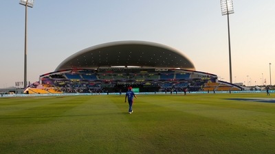 Players perform at the Zayed Cricket Stadium during the Cricket Twenty20 World Cup match between New Zealand and Afghanistan in Abu Dhabi, UAE, Sunday, Nov. 7, 2021.&nbsp; (AP)