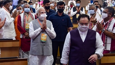 Prime Minister Narendra Modi and BJP chief JP Nadda at the national executive committee meeting in New Delhi on Sunday. (PTI) Prime Minister Narendra Modi and BJP chief JP Nadda at the national executive committee meeting in New Delhi on Sunday. (PTI)