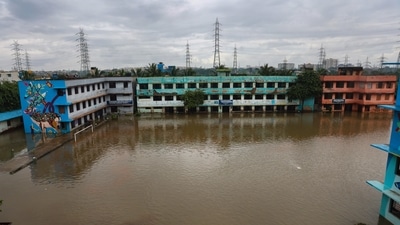 View of a waterlogged area following heavy rain in Chennai. (PTI Photo) View of a waterlogged area following heavy rain in Chennai. (PTI Photo)