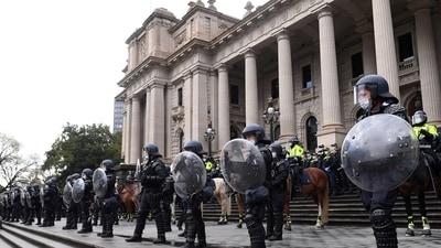 Riot police guard Victoria's Parliament House as activists protest against coronavirus disease in Melbourne, Australia in this file picture taken in September 2021 (Reuters/Representative Photo) Riot police guard Victoria's Parliament House as activists protest against coronavirus disease in Melbourne, Australia in this file picture taken in September 2021 (Reuters/Representative Photo)