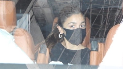 Alia Bhatt wore a black outfit. There is still no confirmation about her and Ranbir Kapoor's wedding date. (Varinder Chawla) 