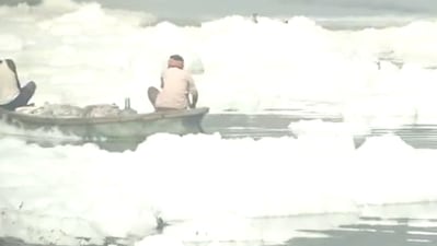 Toxic foam on the Yamuna river at Kalindi Kunj in Delhi on Sunday. (ANI Twitter)