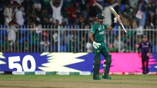 Pakistan's captain Babar Azam celebrates scoring fifty runs during the Cricket Twenty20 World Cup match between Pakistan and Scotland in Sharjah, UAE, Sunday, Nov. 7, 2021.&nbsp;(AP)