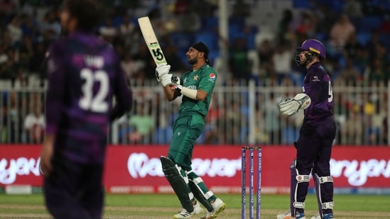 Pakistan'S Shoaib Malik, Center, Watches His Shot During The Cricket Twenty20 World Cup Match Between Pakistan And Scotland In Sharjah, Uae, Sunday, Nov. 7, 2021.&Amp;Nbsp;(Ap)