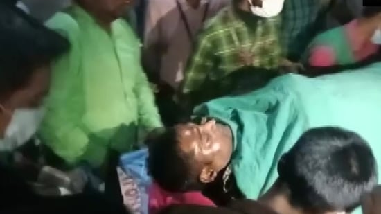 A policeman being taken to hospital. (ANI Twitter) A policeman being taken to hospital. (ANI Twitter)