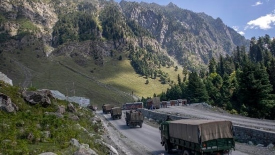 Indian army convoy moves on the Srinagar- Ladakh highway at Gagangeer, northeast of Srinagar, Jammu and Kashmir.(AP Photo/File) Indian army convoy moves on the Srinagar- Ladakh highway at Gagangeer, northeast of Srinagar, Jammu and Kashmir.(AP Photo/File)