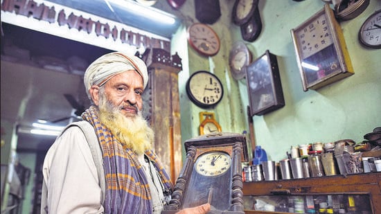 Suhail Akhtar, a clockmaker at his shop near Jama Masjid, is considered an encyclopedia on mechanical clocks.(Ht Photo/Sanchit Khanna)