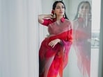 Sobhita Dhulipala paints Kochi red with love in <span class='webrupee'>₹</span>19k scarlet organza saree(Instagram/sobhitad)