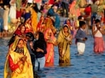 During the festival, devotees take a dip in rivers, ponds, and other water bodies and seek blessings from the Sun God. Here's how devotees celebrated the first day of the festival which is known as Nahai Khai or Naha Khay.(HT File Photo)