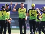 Australia's Josh Hazlewood, centre, celebrates with teammates after the dismissal of Bangladesh's Soumya Sarkar during the Cricket Twenty20 World Cup match between Australia and Bangladesh in Dubai, UAE, Thursday, Nov. 4, 2021.(AP) Australia's Josh Hazlewood, centre, celebrates with teammates after the dismissal of Bangladesh's Soumya Sarkar during the Cricket Twenty20 World Cup match between Australia and Bangladesh in Dubai, UAE, Thursday, Nov. 4, 2021.(AP)