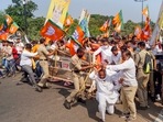 Police stops a BJP youth activists during a protest against the visit of Odisha CM Naveen Pattnaik to Kalahandi to enquire into the alleged case of murder of Mamita Meher.(PTI) Police stops a BJP youth activists during a protest against the visit of Odisha CM Naveen Pattnaik to Kalahandi to enquire into the alleged case of murder of Mamita Meher.(PTI)