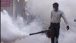 New Delhi Municipal Council (NDMC) personnel during fumigation of the Gol Market area amid rising dengue cases in New Delhi. (Hindustan Times/ File)