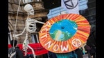 People demonstrate during the UN Climate Change Conference (COP26), in Glasgow, Scotland, November 7, 2021 (REUTERS) People demonstrate during the UN Climate Change Conference (COP26), in Glasgow, Scotland, November 7, 2021 (REUTERS)